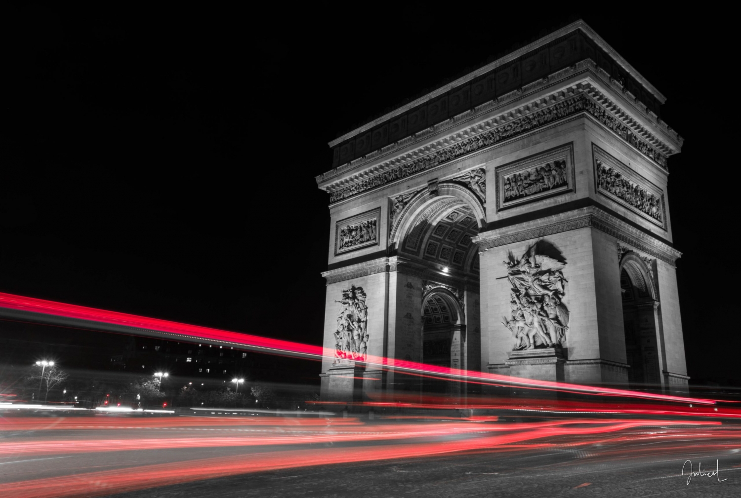 A ribbon dancer at the Arc de Triomphe
